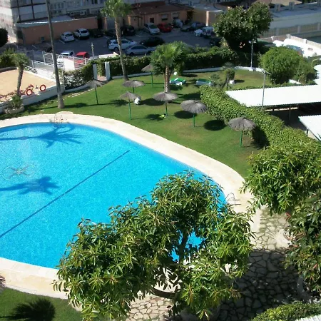 Apartamento mediterraneo, muy centrico, en Plaza Triangular, soleado, con jardines y piscina y la playa enfrente andando, con parking exterior comunitario-3